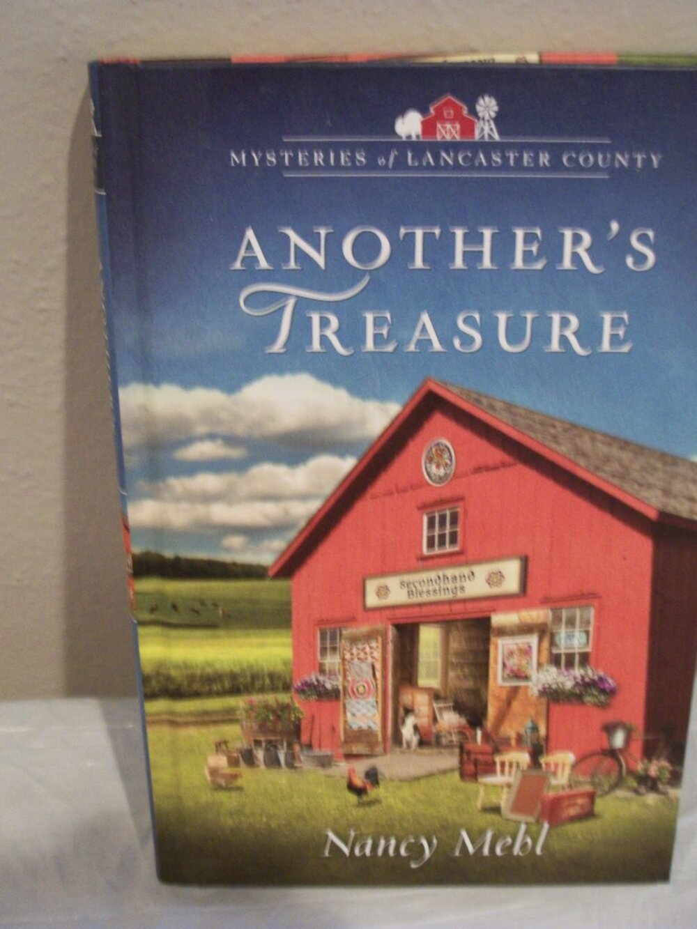 Mysteries of Lancaster County Hardcover Book "Another's Treasure" by Nancy Mehl